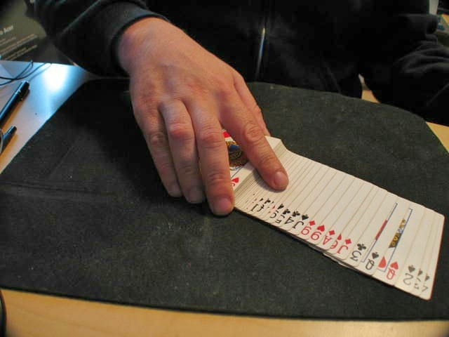 Hidden card magic trick